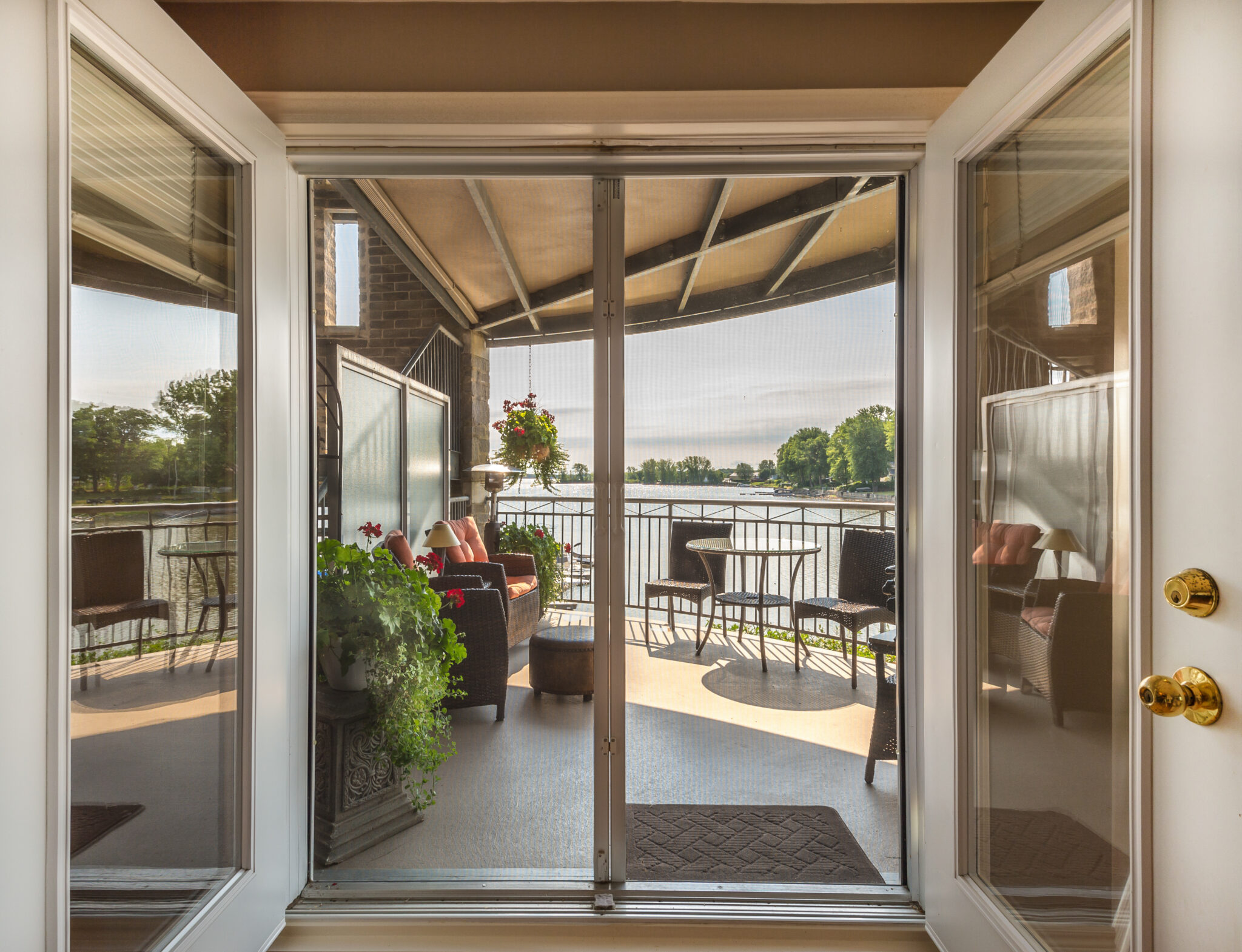 Inside view overlooking balcony and lake